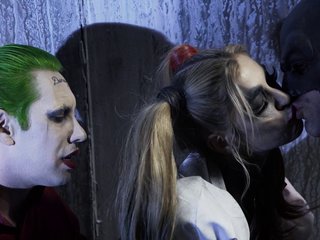 Joker and Batman team up and surround Harley Quinn with their cocks!