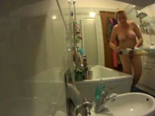 My mom caught on hidden camera in our bathroom. Watch her first tits, her ass, her mature body, her pussy. Showering, soaping, w